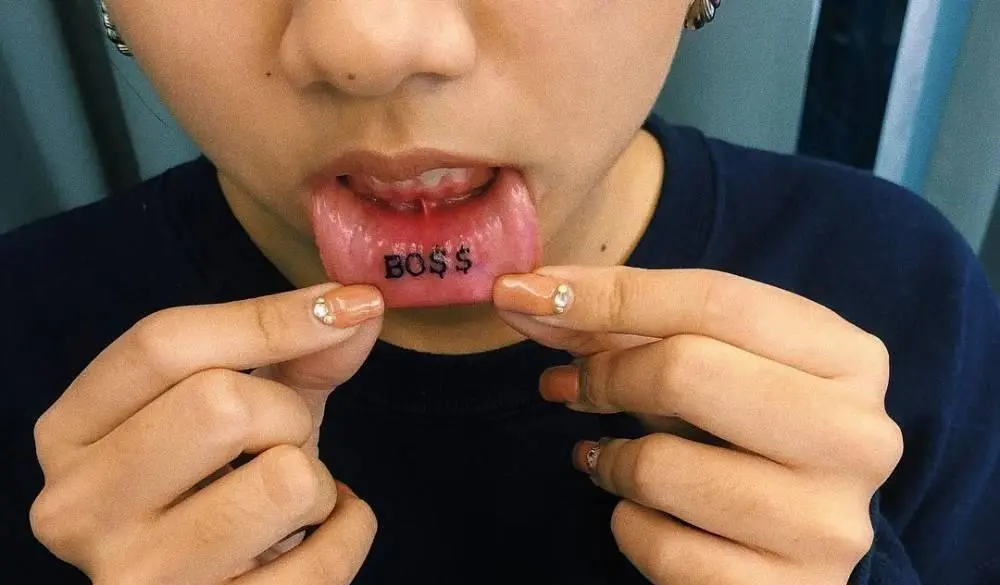 Tattoo boss on the lips