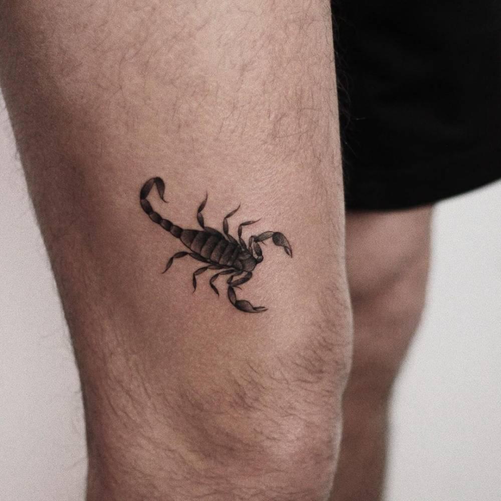 Фото тату скорпион на ноге