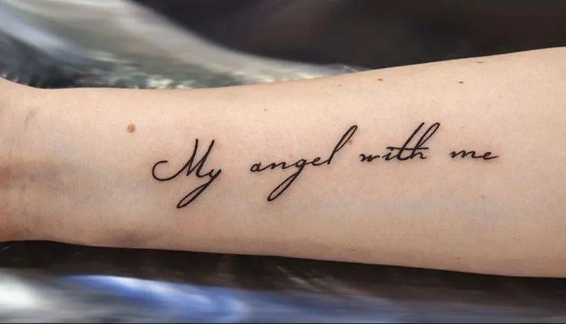 Tattoo my angel is always with me on my arm