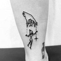 string puppet tattoo