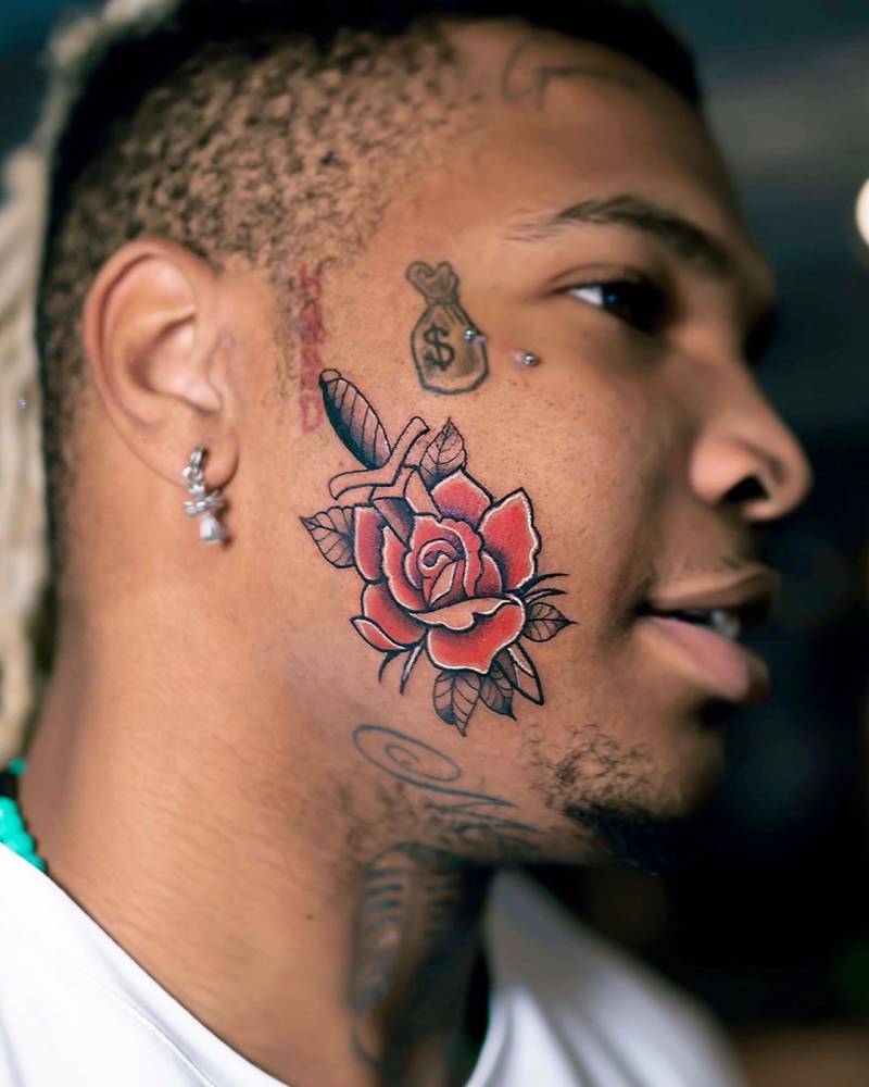 Татуировки мужские на лице на щеке