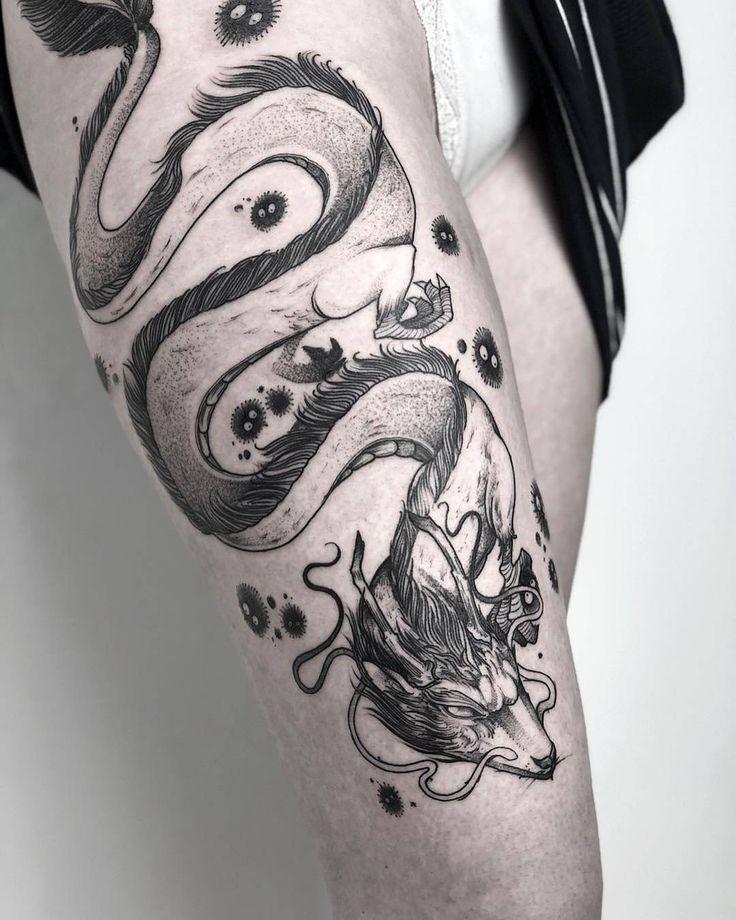 Photo of a dragon tattoo Haku on his feet.