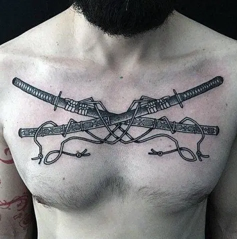 Tattoo with two katanas