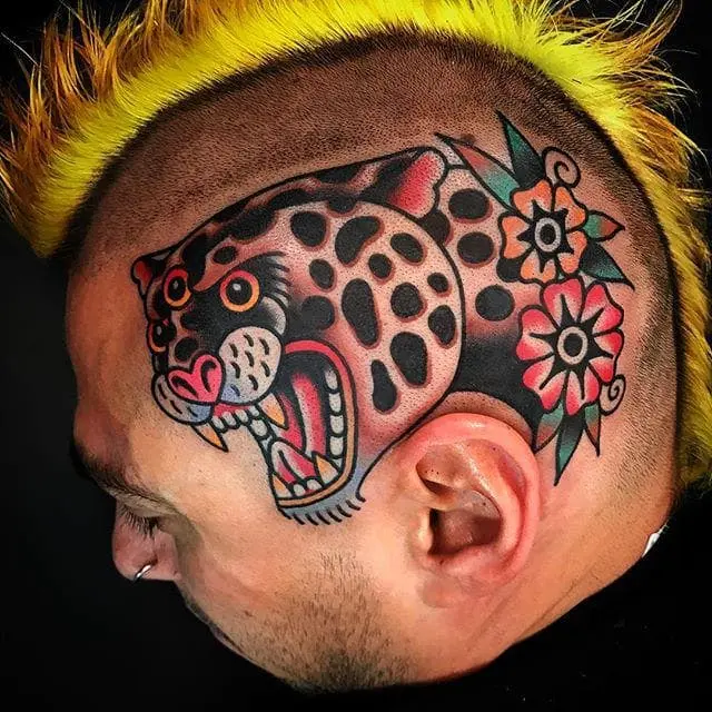 Snow Leopard Tattoo On Shaved Head