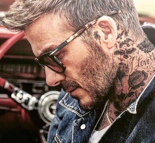 David Beckham tattoo op hals en holle