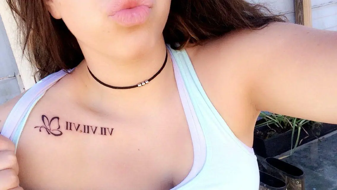 Butterfly Roman Numeral Tattoo