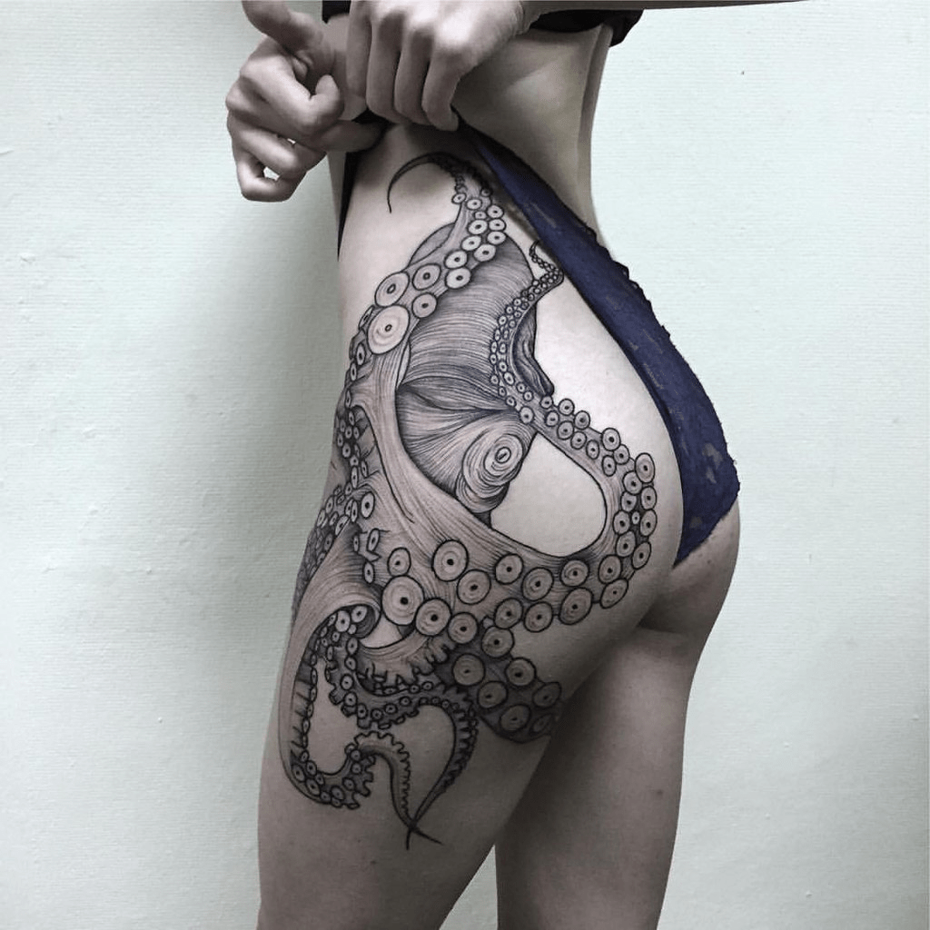 Photo of an octopus tattoo on a girl's bottom.
