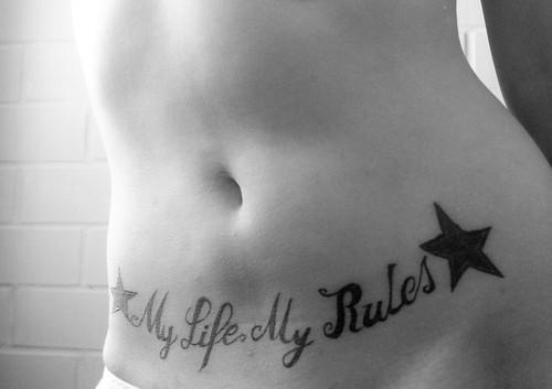 Татуировка my Life my Rules на руке