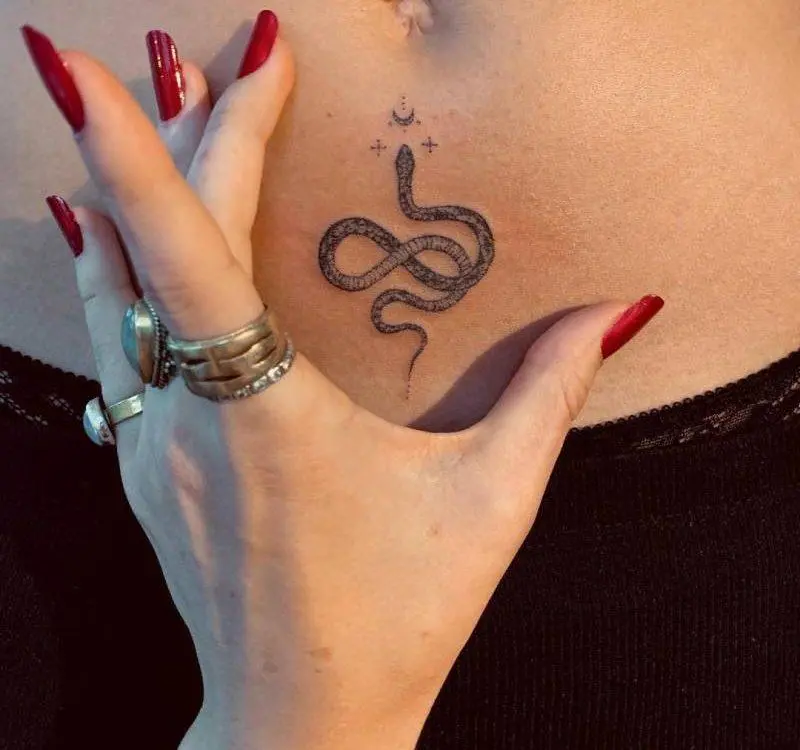 Snake Tattoo On Girl Stomach