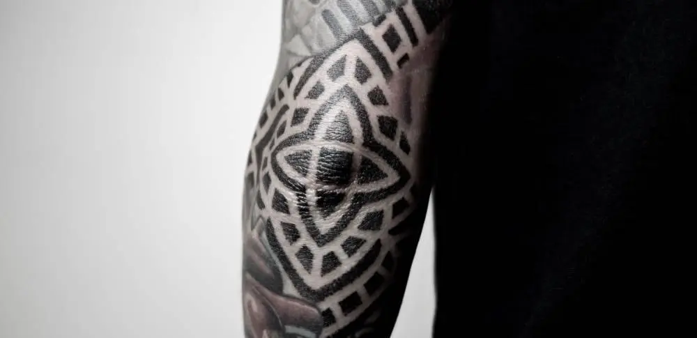 Tattoo with a pattern on the elbow