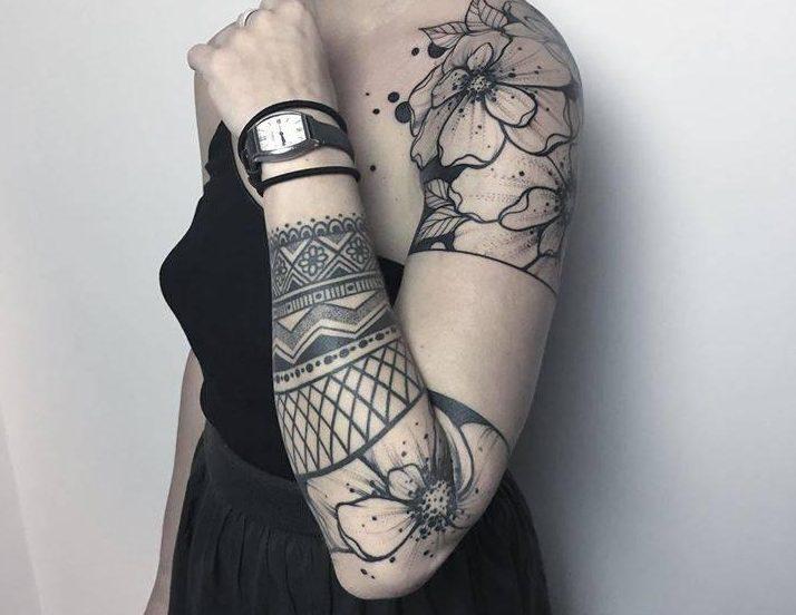 Female sleeve tattoo