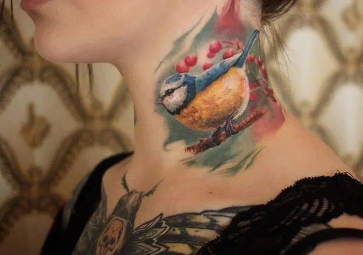 Bird tattoo on girl's neck