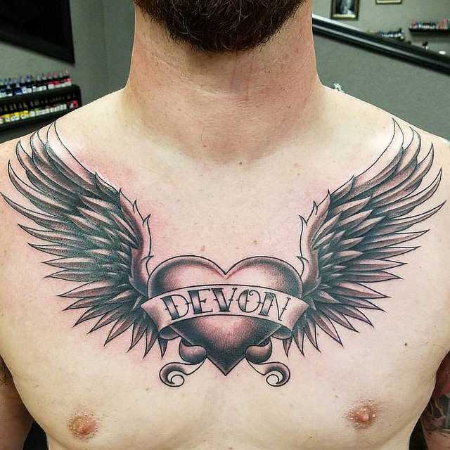 40 татуировок крыла на груди. Что они символизируют?