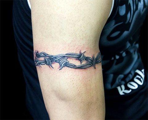 63 тетоважи со бодликава жица (и што тие значат)