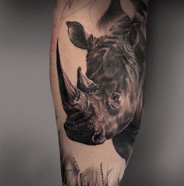 79 Rhinoceros tattoo: designs and meaning - All about tattoos.