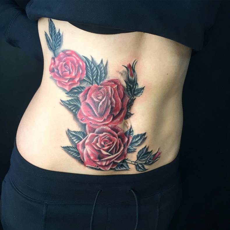 Delicate and sensual rose tattoo: photo and meaning