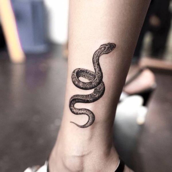 Slangesymbol. Hva representerer slangen?