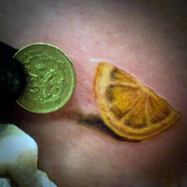 татуировка с лимоном у мужчин 70