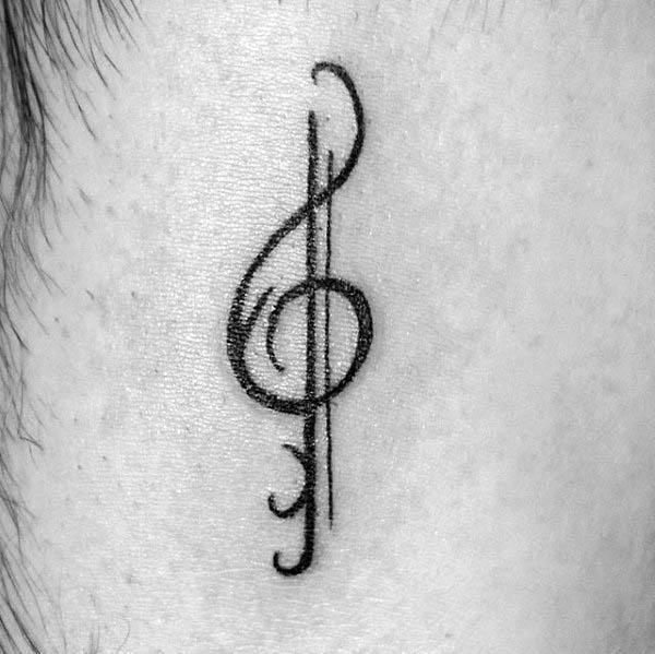 treble clef tattoo 69.