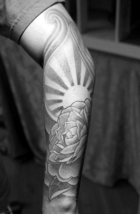татуировка восходящего солнца 63