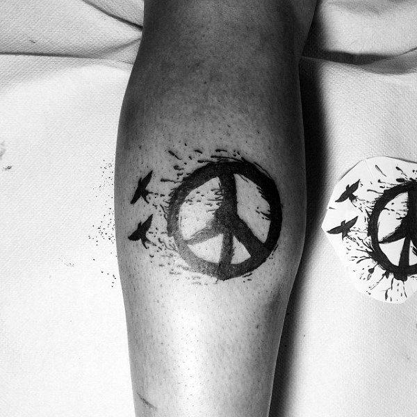 татуировка символ мира 69