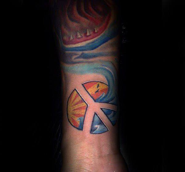 татуировка символ мира 77