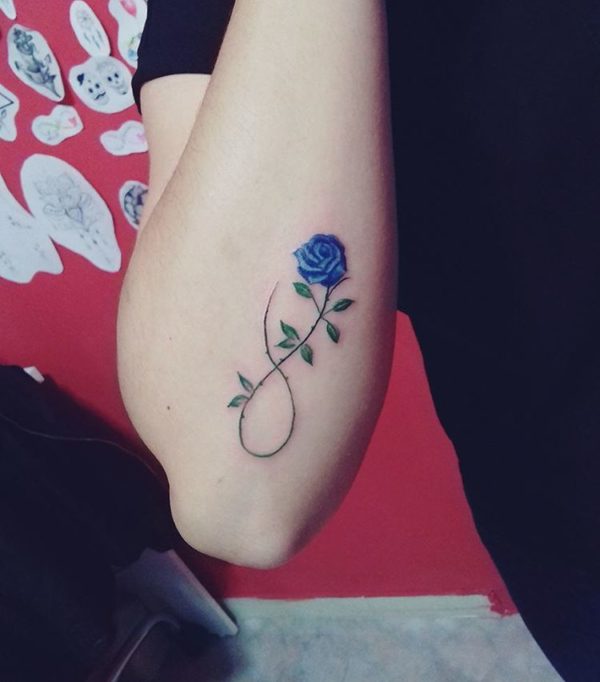 Infinity tattoo with flowers.