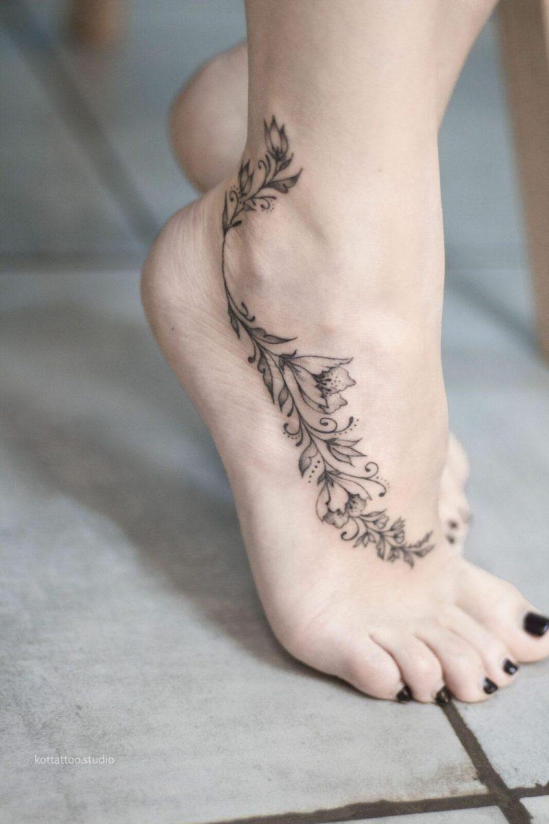女性腿部纹身，很酷的设计
