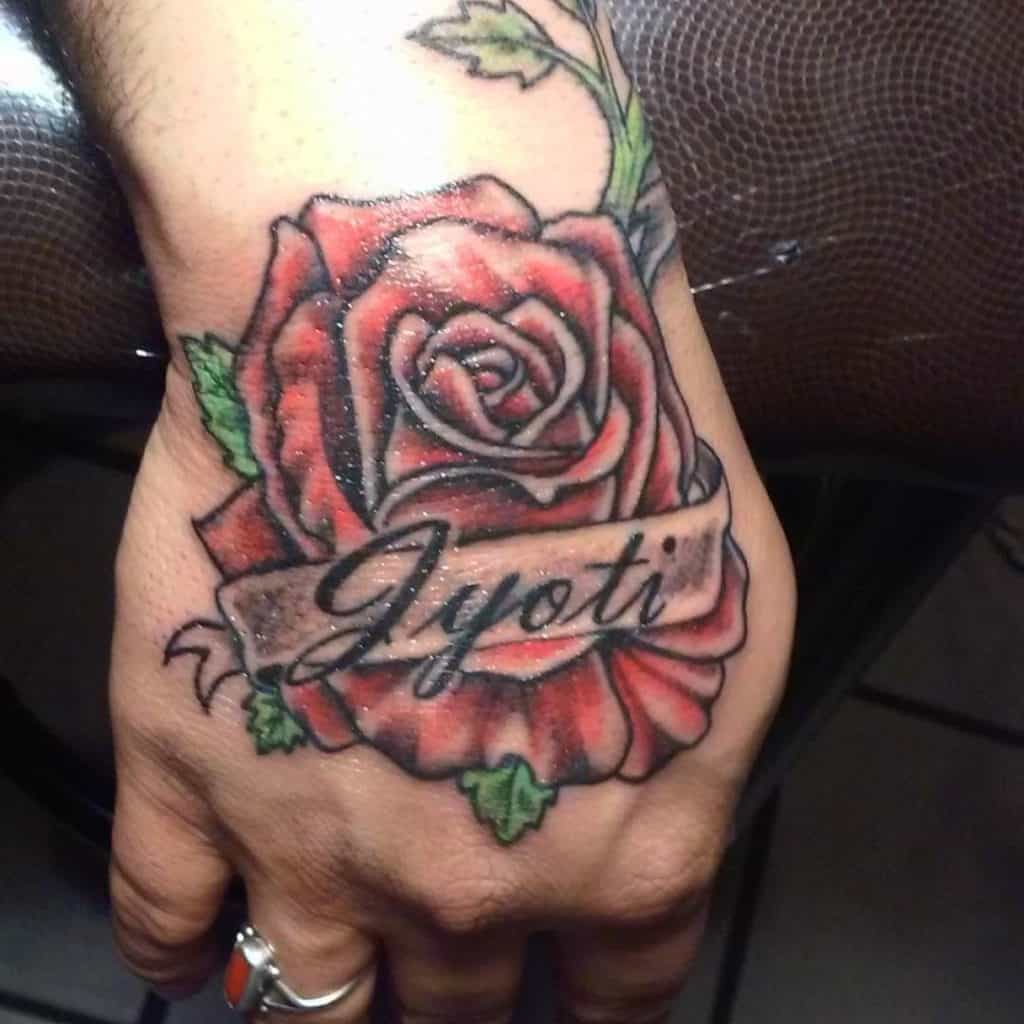 Rose hand tattoo with name