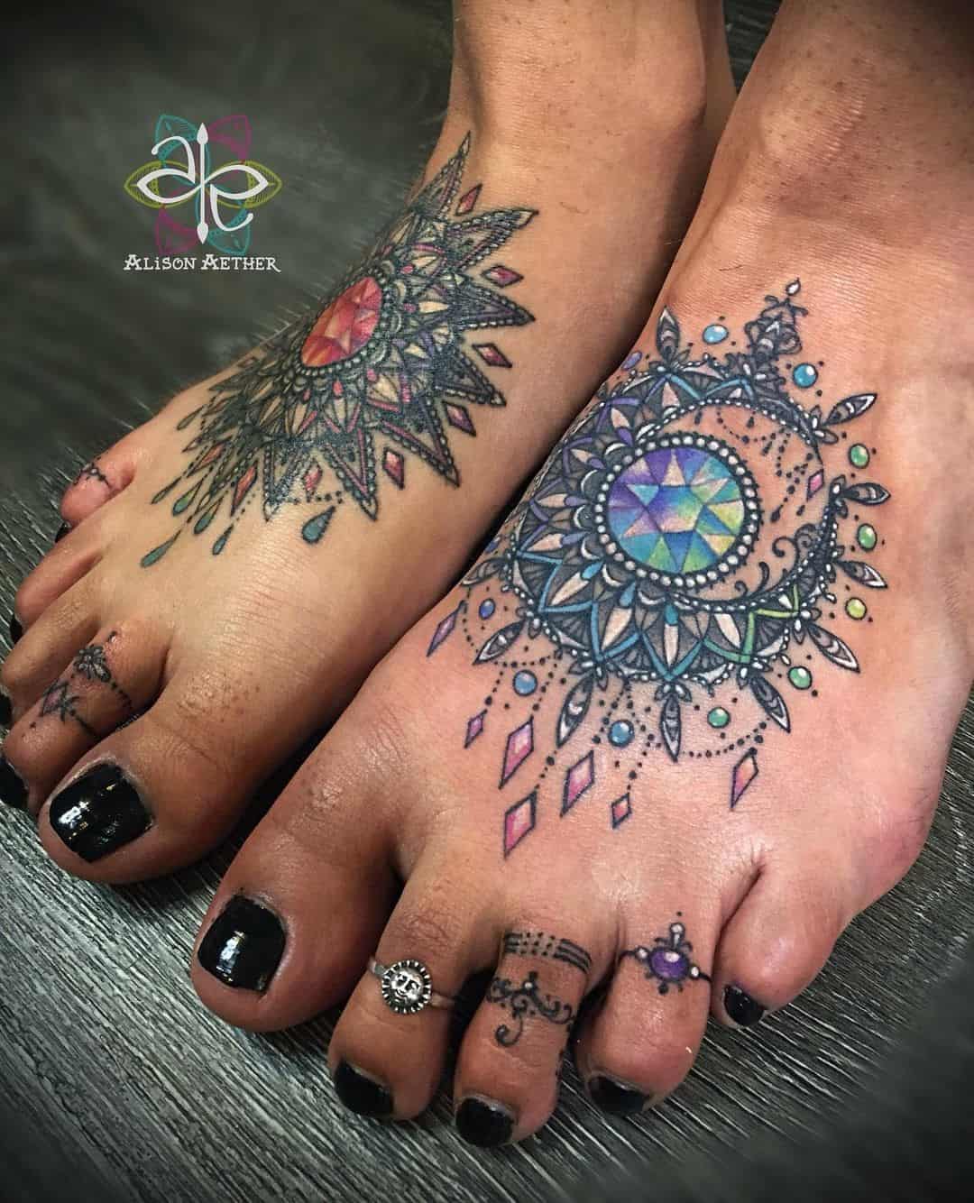 25. Mandala and magical toe tattoos.