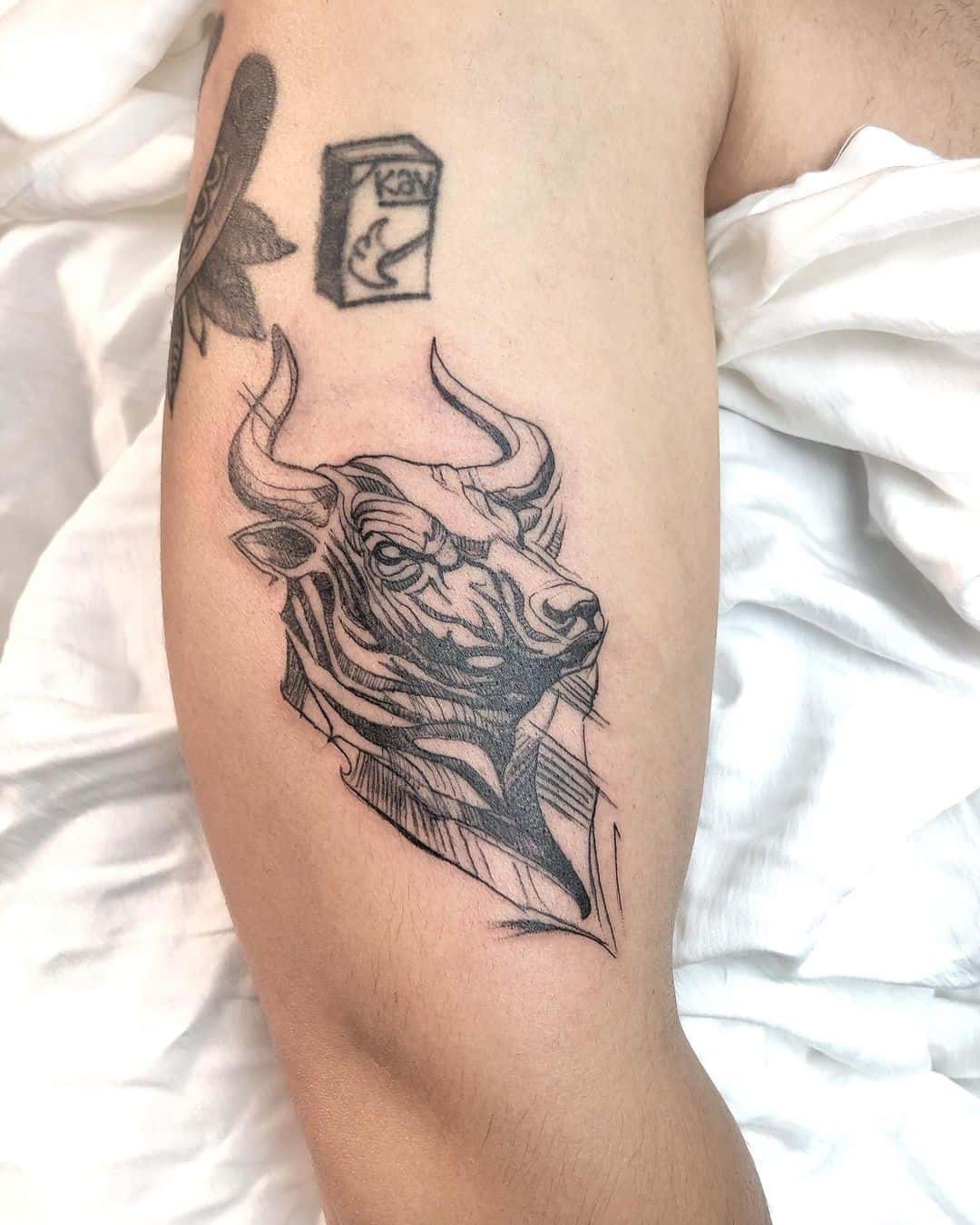 Bull evolving out Woods Landscape tattoo idea | TattoosAI