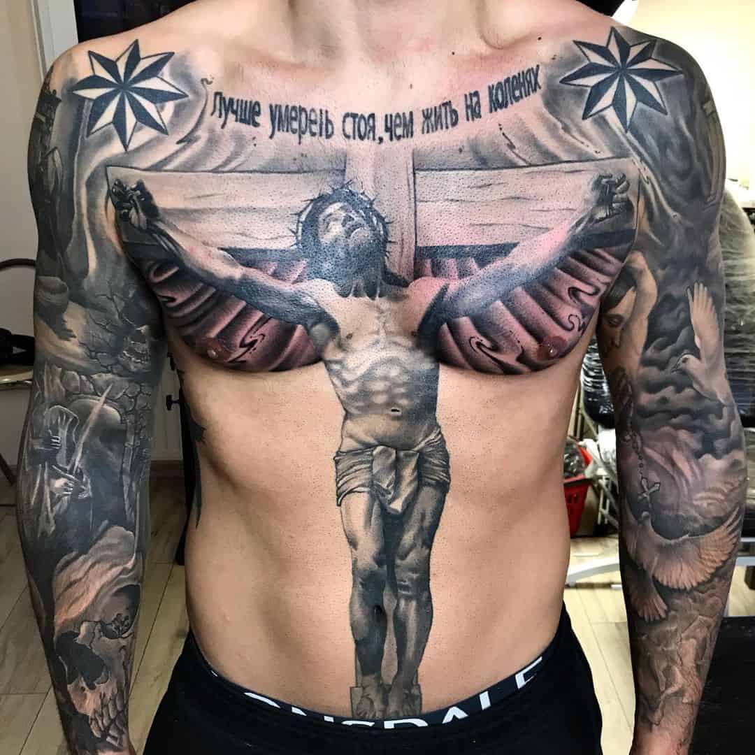 татуировки мужские на руке с распятием