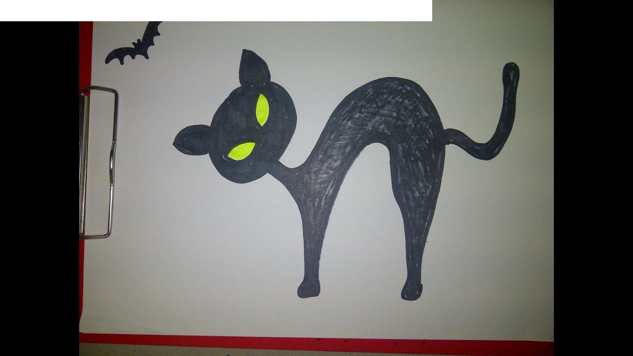 Kā uzzīmēt melnu kaķi